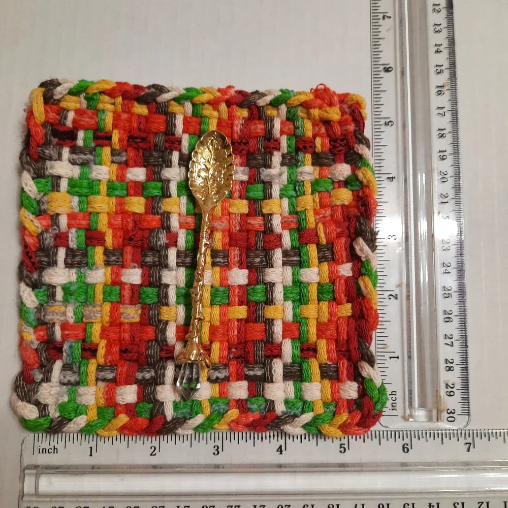 Mug rug and teaspoon